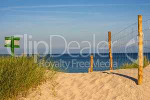Baltic Sea in Poland, beach with beach grass and table