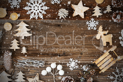 Wooden Background. Frame Of Christmas Decoration Like Sled And Snowflakes