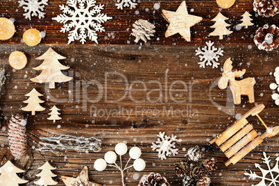 Frame Of Christmas Decoration Like Tree And Snowflakes. Wooden Background