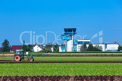 Tractor and salat field on the Filder plains