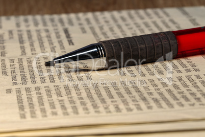 Ballpoint pen. Ballpoint pen lies on a newspaper