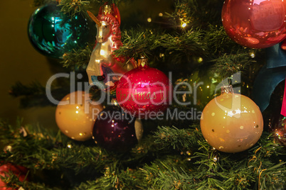 Christmas trees decorated with various bright toys
