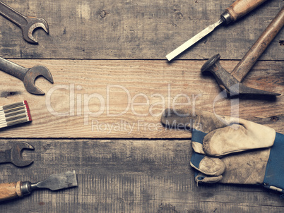 Old used tools on a workbench