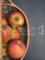 Fresh organic apples in a basket
