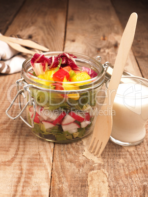 Tasty vegetarian salad in a jar