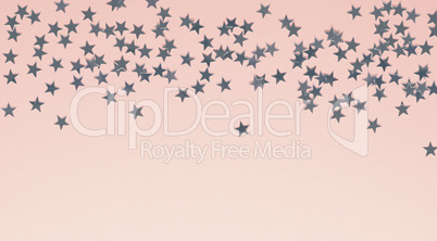 Pink Christmas background with stars