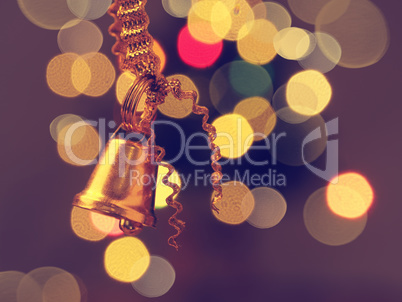 Golden bell with blurred lights background