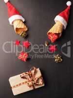 Ice cream cones with hat of Santa and gift boxes