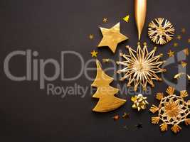 Golden Christmas decoration on a dark background, space for text