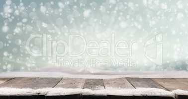Rustic wooden plank with snow background