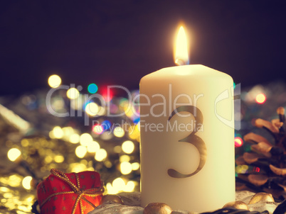 Third Advent candle