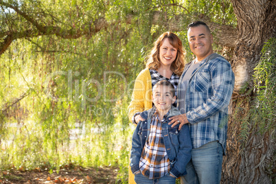 Mixed Race Family Portrait Outdoors