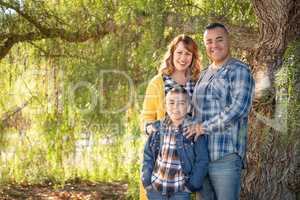 Mixed Race Family Portrait Outdoors