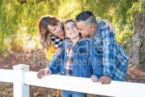 Mixed Race Family Portrait Outdoors