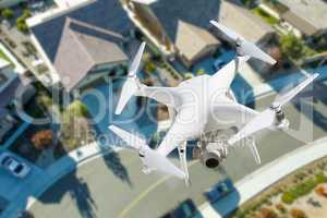 Unmanned Aircraft System Quadcopter Drone In The Air Over Reside