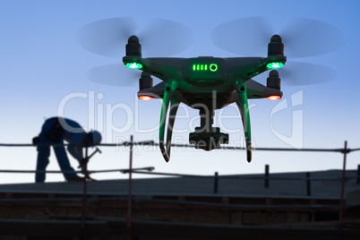 Silhouette of Unmanned Aircraft System Quadcopter Drone In The A