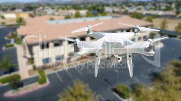 Unmanned Aircraft System Quadcopter Drone In The Air Near Corpor