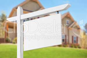 Blank Real Estate Sign in Front of Beautiful New House