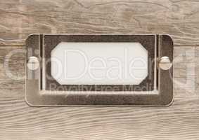 Blank Metal File Cabinet Label Frame on Wood