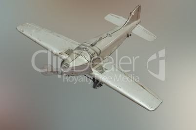 Picture of a retro gray metal toy airplane