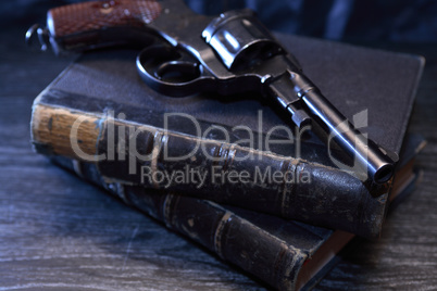 Old Revolver On Book