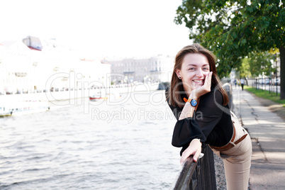 Girl In City Near River