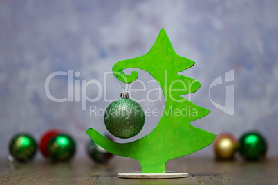 Christmas tree in plywood on a blurry background