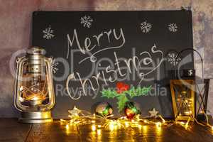 Merry Christmas - Christmas still life with lanterns and a garland