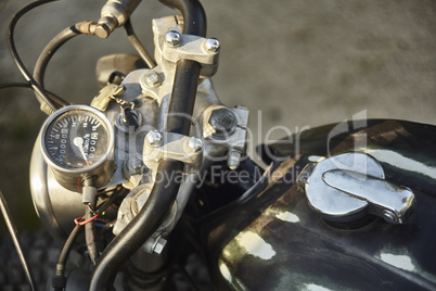 The odometer of a vintage motorcycle