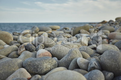 Natural round pebbles on the beach