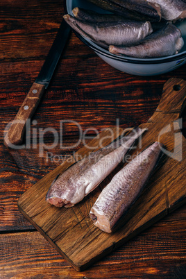 Hake carcasses on cutting board