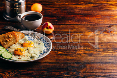 Breakfast toast with fried eggs with vegetables, fruits and coff