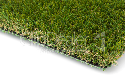 Section of Artificial Turf Grass On White Background