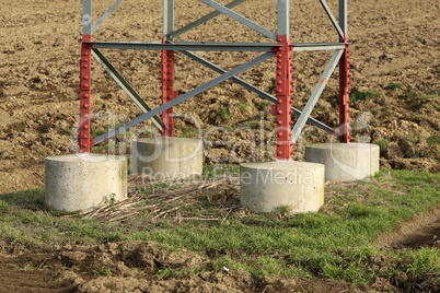 The foundation on which the high voltage mast stands