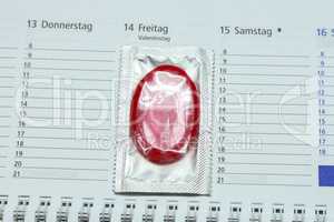 condom on the calendar with the date of Valentine's day