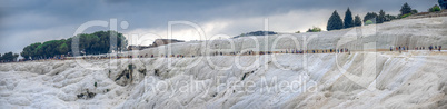 Many tourists on Pamukkale Mountain in Turkey