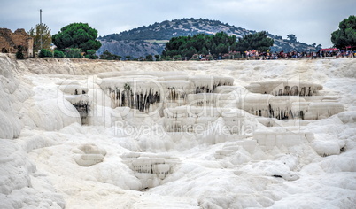 Many tourists on Pamukkale Mountain in Turkey