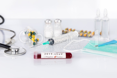 Blood test tube with the Coronavirus disease for virus test and