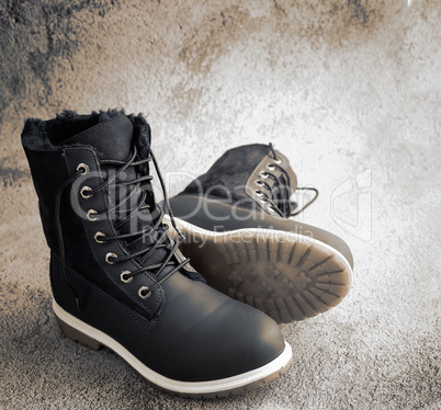 Comfortable winter boots with lacing, insulated with fur.