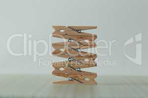 Construction of wooden clothespins on the table