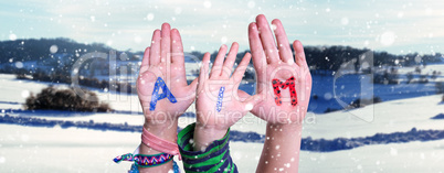 Children Hands Building Word Aim, Snowy Winter Background