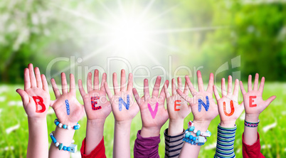 Children Hands Building Word Bienvenue Means Welcome, Grass Meadow