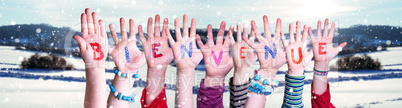 Children Hands Building Word Bienvenue Means Welcome, Snowy Winter Background