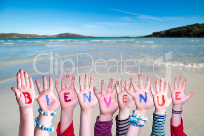 Children Hands Building Word Bienvenue Means Welcome, Ocean Background