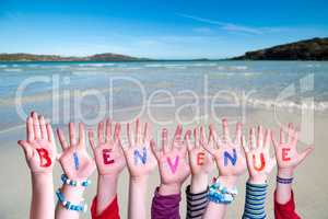 Children Hands Building Word Bienvenue Means Welcome, Ocean Background