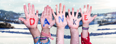 Children Hands Building Word Danke Means Thank You, Snowy Winter Background