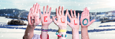 Children Hands Building Word Hello, Snowy Winter Background