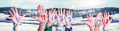 Children Hands Building Word I Miss You, Snowy Winter Background