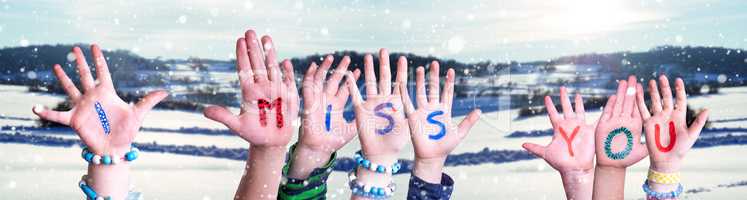 Children Hands Building Word I Miss You, Snowy Winter Background