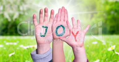 Children Hands Building Word Joy, Grass Meadow